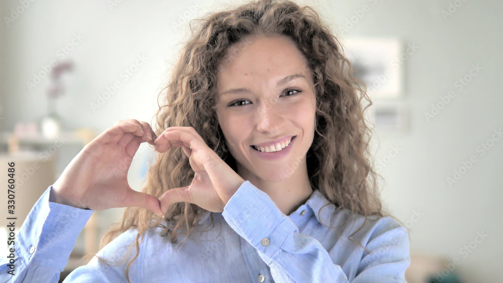 © stockbakers - Handmade Heart by Curly Hair Woman © stockbakers - Handmade Heart by Curly Hair Woman