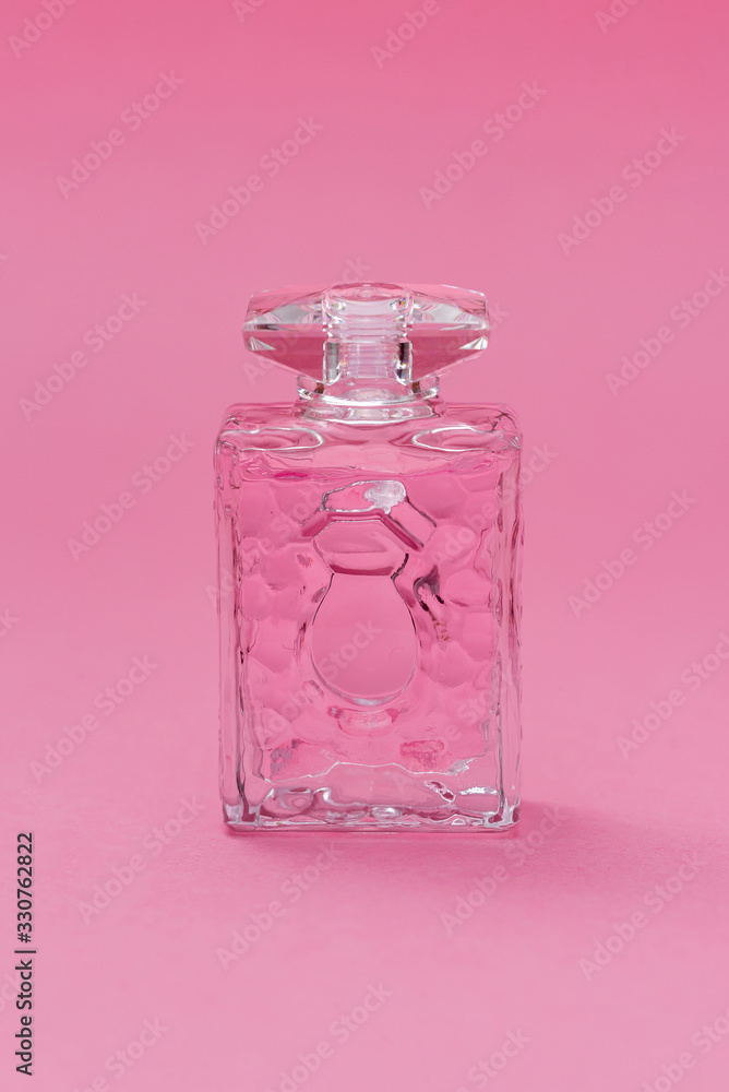 female sampler of perfume on a pink background female sampler of perfume on a pink background