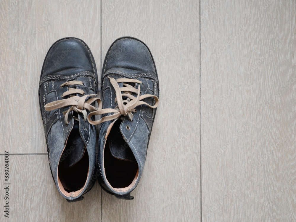 A pair of men's worn boots.