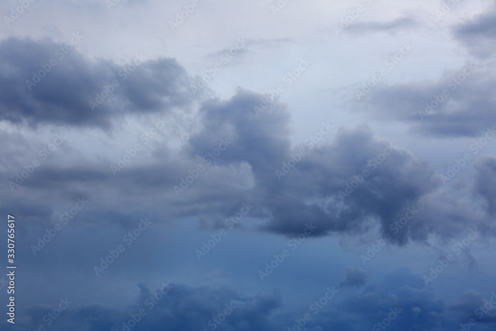 Beautiful clouds in the blue sky, heavenly background