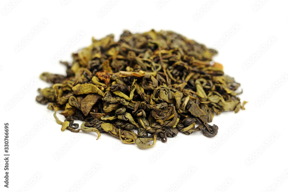 Green tea with flowers and fruits top view close up isolated on white Green tea with flowers and fruits top view close up isolated on white