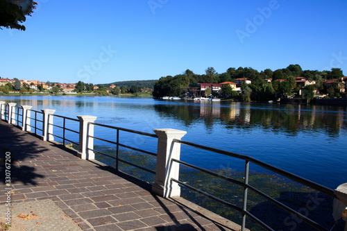 Fototapeta Naklejka Na Ścianę i Meble -  Sesto Calende (VA), Italy - September 15, 2016: The Ticino river view from Sesto Calende, Lombardy, Piedmont, Italy.