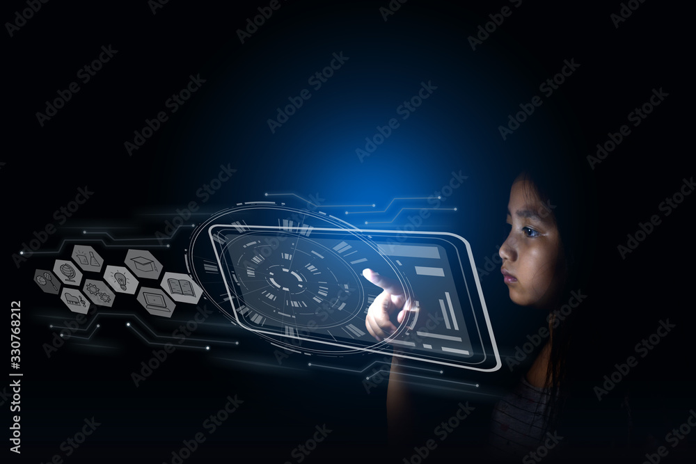 Fototapeta premium Little cute Girls use technology to find knowledge&learn to use the internet to find information.