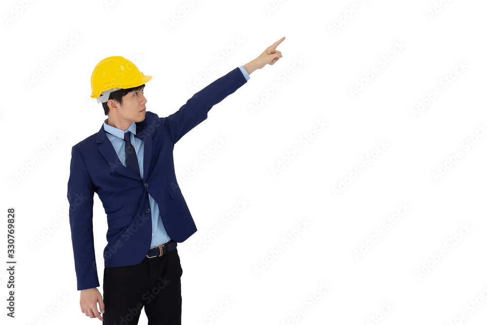 A young Asian foreman wears a yellow helmet isolated on white background. A young Asian foreman wears a yellow helmet isolated on white background.