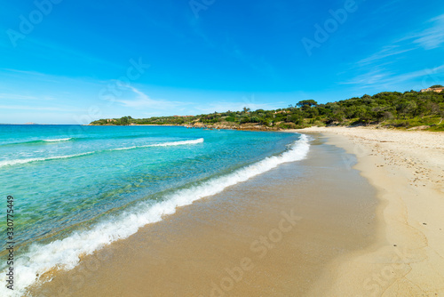 Fototapeta Naklejka Na Ścianę i Meble -  Small waves in Rena Bianca beach in Costa Smeralda