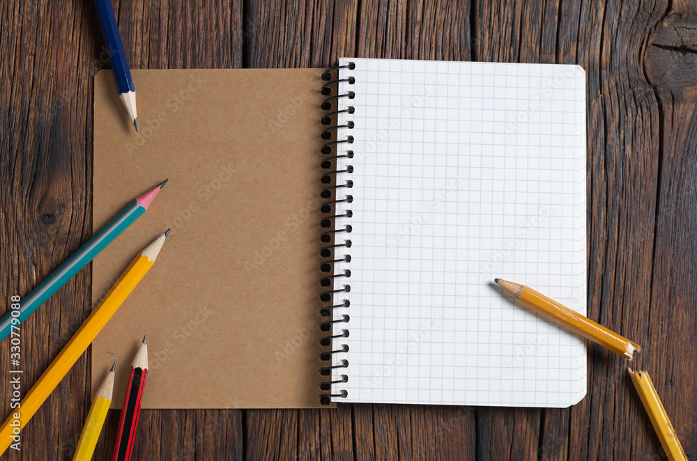 Notebook and pencils Notebook and pencils