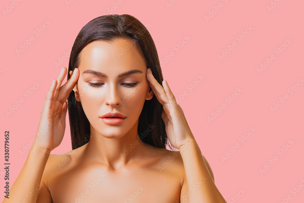 Fototapeta premium young woman with headache 