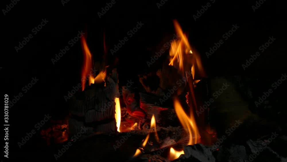 fire in a wood stove and fireplace fire in a wood stove and fireplace