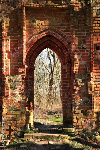 preserved entrance to the medieval church on a sunny day