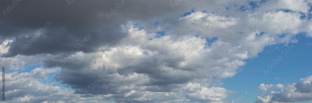Beautiful blue sky background panorama at daylight with white cumulus clouds. Backgroud banner Beautiful blue sky background panorama at daylight with white cumulus clouds. Backgroud banner