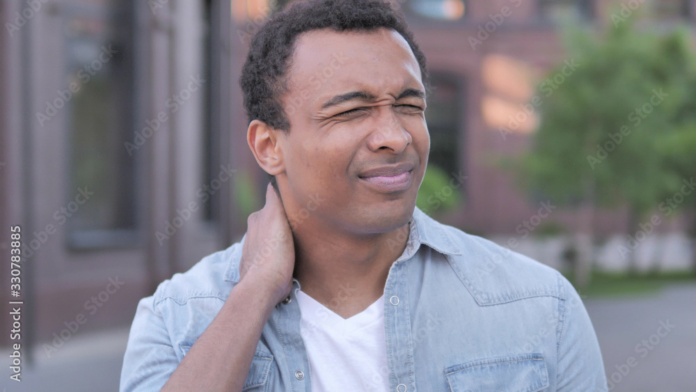 Tired African Man with Neck Pain Tired African Man with Neck Pain