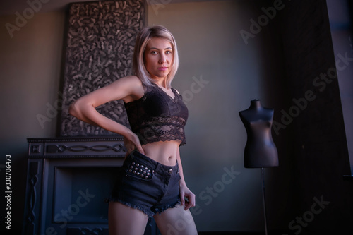 Obraz na plátně Daring girl model in shorts