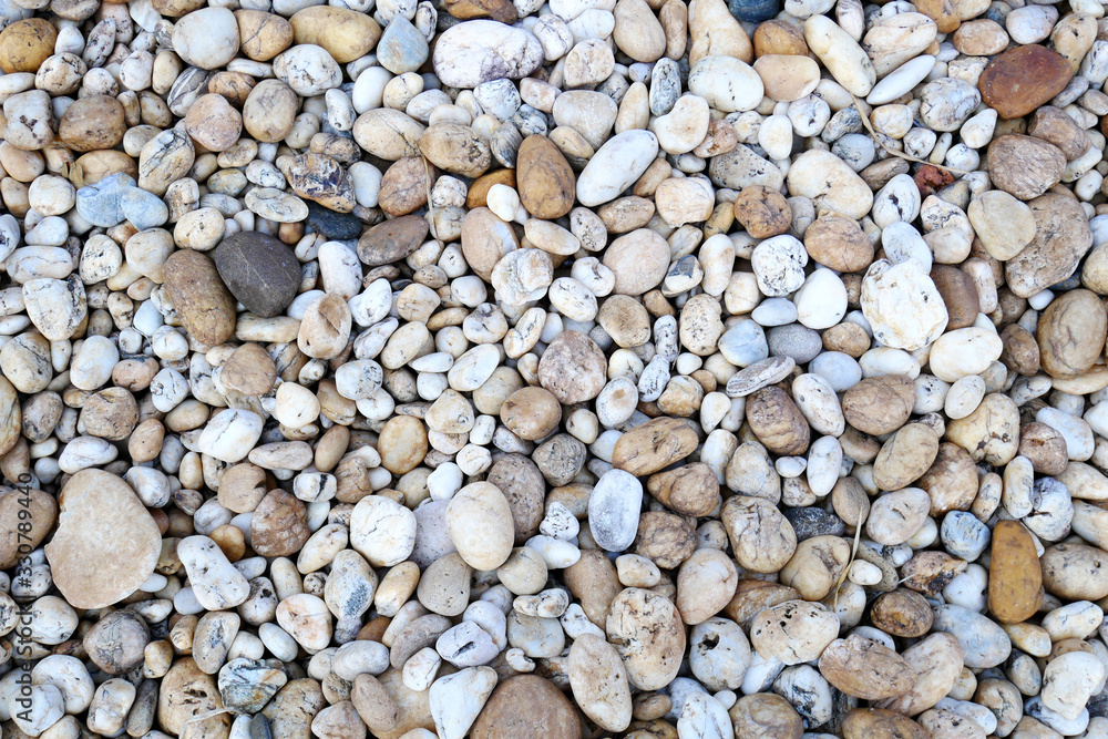 white stone background. pebbles on the beach