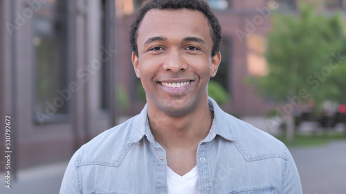 Outdoor Portrait of Smiling African Man