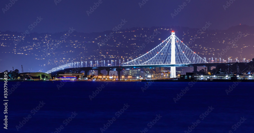 Panorama of the Bay Bridge from San Francisco viewed from Marina District in San Francisco California USA. Long exposure
