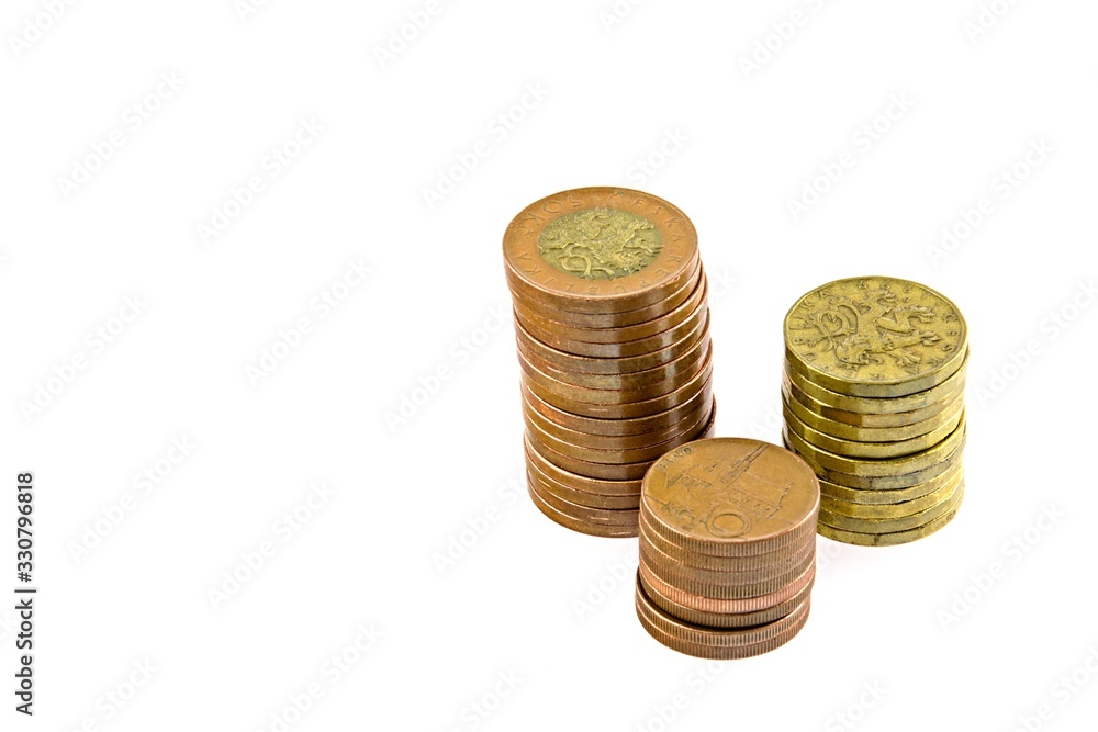 Czech money, columns of coins, isolated on white background. 50 crown coins, 20 crown coins, 10 crown coins. Czech money, columns of coins, isolated on white background. 50 crown coins, 20 crown coins, 10 crown coins.