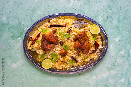 Mandi Kabsa, Yemenis style. Festive dish with baked chicken and rice
