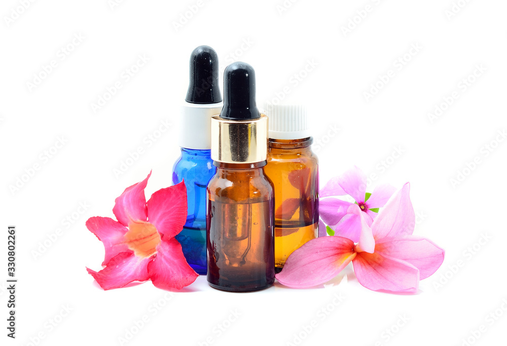 Essence oil, zen stone and calamansi in spa concept Essence oil, zen stone and calamansi in spa concept