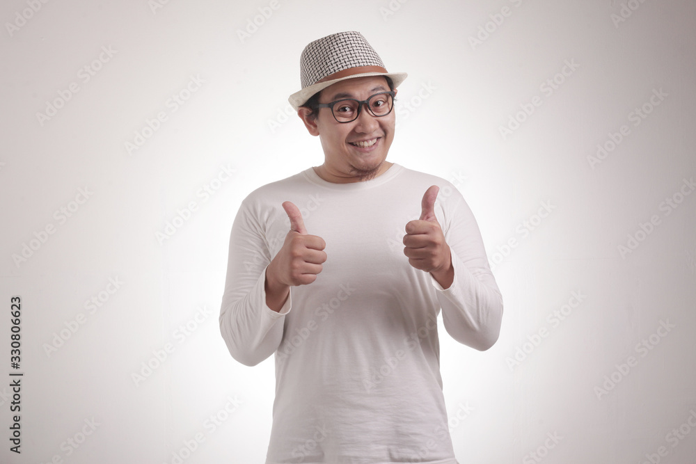 Young Man Showing Thumbs Up Gesture OK Sign Young Man Showing Thumbs Up Gesture OK Sign