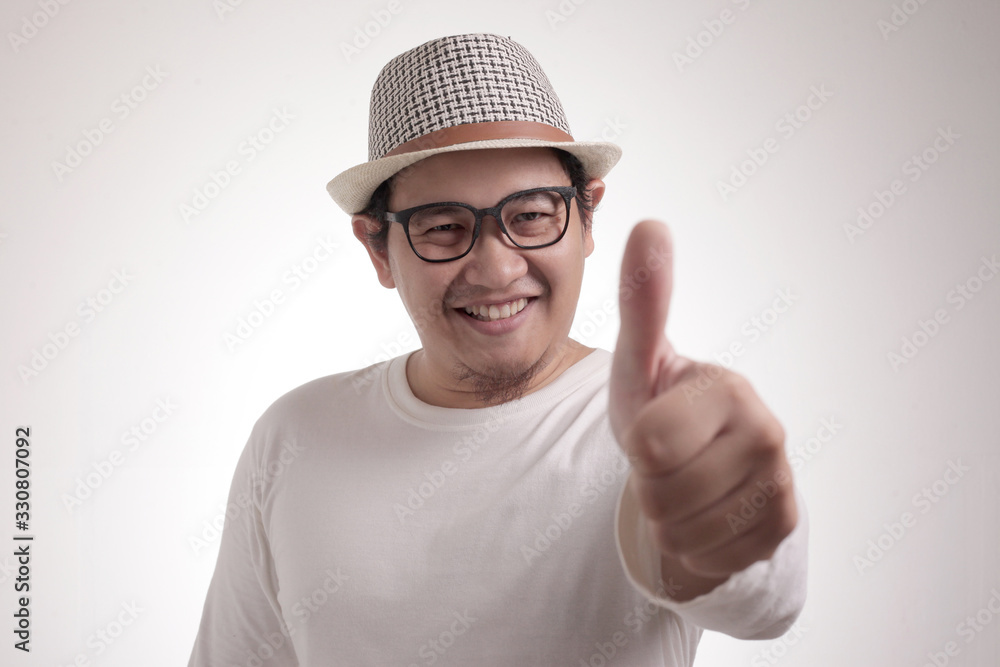 Young Man Showing Thumbs Up Gesture OK Sign Young Man Showing Thumbs Up Gesture OK Sign