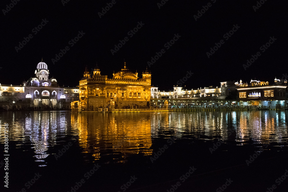 Details at night of the Golden Temple in Amritsar, Punjab, India
