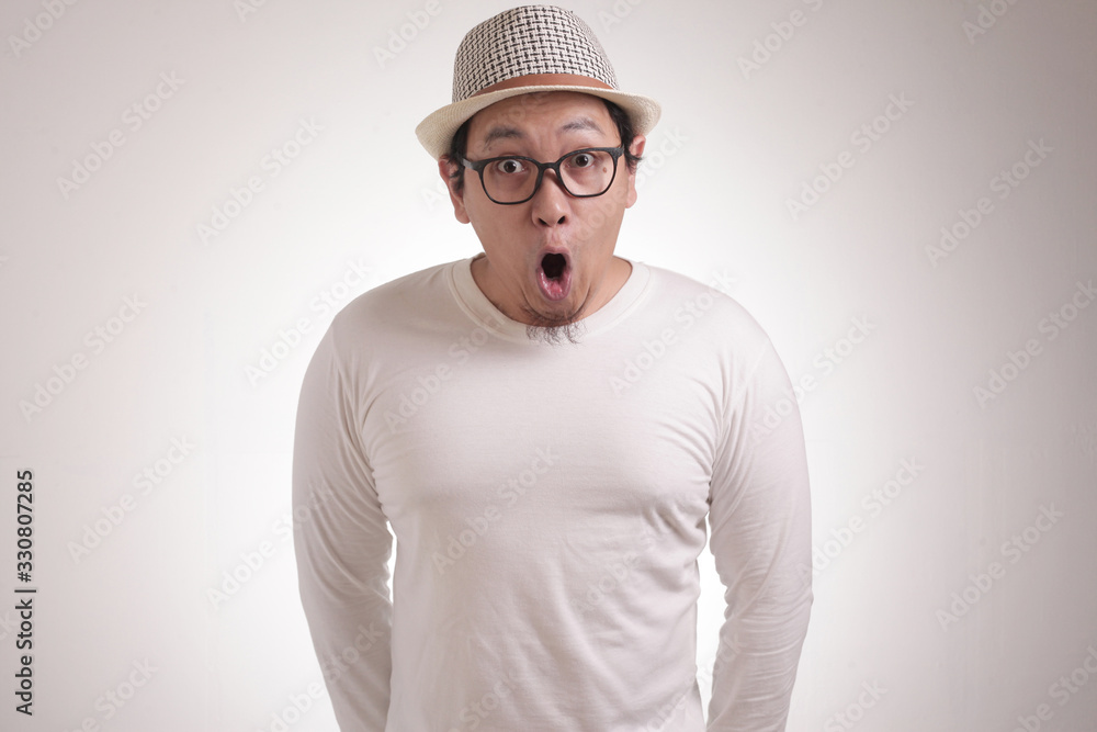 Asian Man Shocked with Mouth Open Asian Man Shocked with Mouth Open