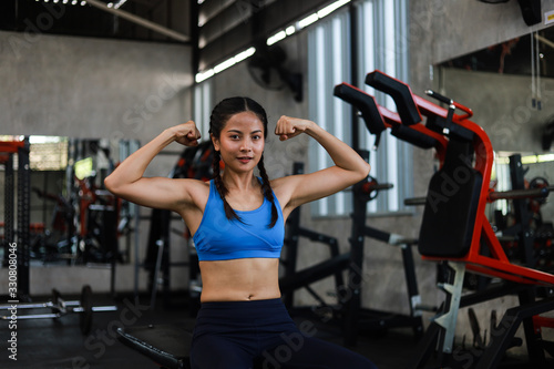 Asian woman in fitness gym