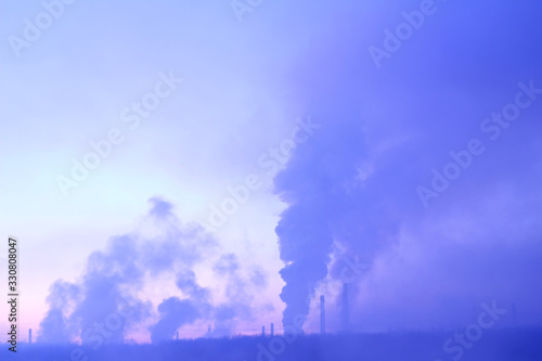 Poisoning of nature. Industrial dawn. Nature pollution concept copy space. Metallurgical factory background.