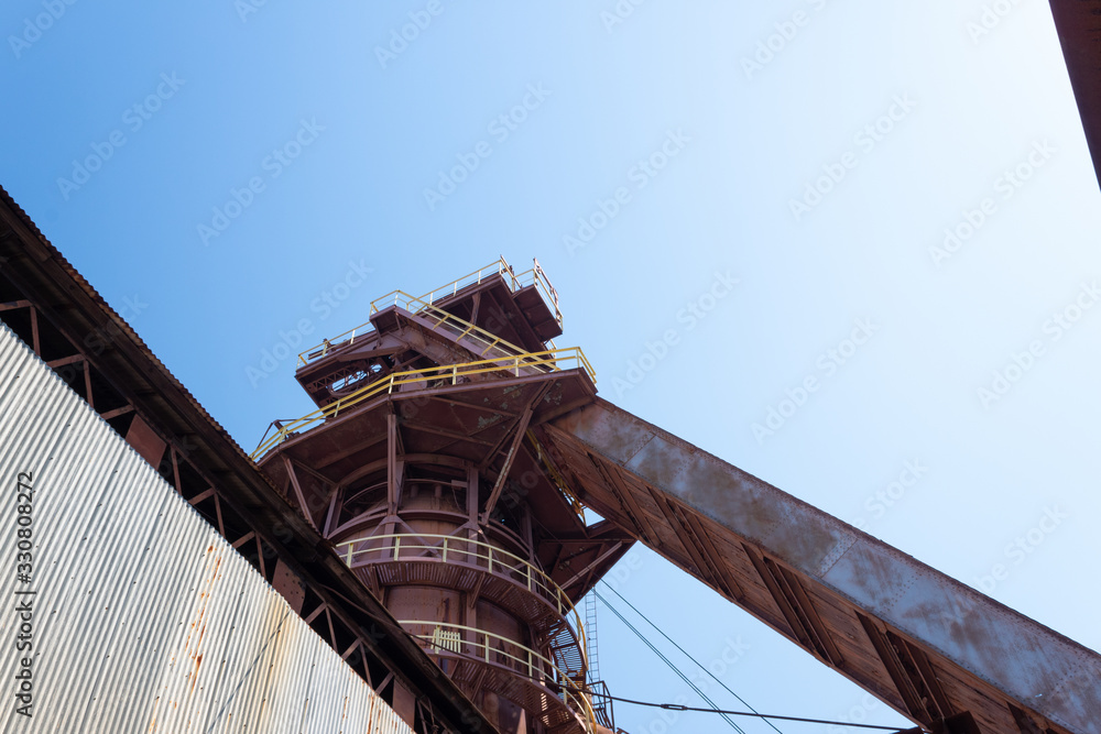 Sloss Furnaces National Historic Landmark, Birmingham Alabama USA, details of tower and chute from historic manufacturing plant Sloss Furnaces National Historic Landmark, Birmingham Alabama USA, details of tower and chute from historic manufacturing plant
