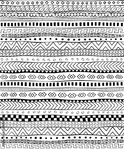 Graphic ethnic seamless pattern with tribal motifs. Perfect for fabric and other design in boho style.