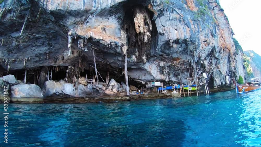 An entrance to a cave near Phi Phi islands, Thailand. An entrance to a cave near Phi Phi islands, Thailand.