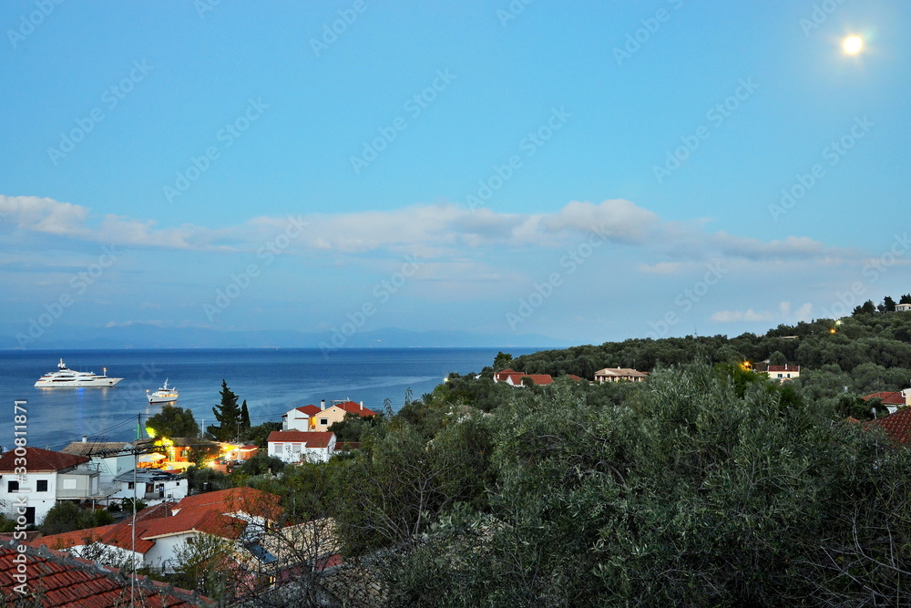 Greece,island Paxos-view on  the town Gaios and moon