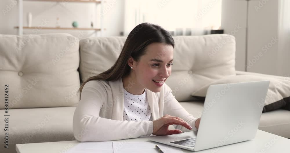 Happy girl student using laptop celebrating online success. Excited young woman winning internet test gets good result concept at home. Lucky female user looking at computer receiving new opportunity. Happy girl student using laptop celebrating online success. Excited young woman winning internet test gets good result concept at home. Lucky female user looking at computer receiving new opportunity.