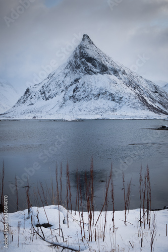 Unique mountain called Volanstind located in Lofoten islands close to Ramberg town. Very popular hiking place offers amazing view. photo