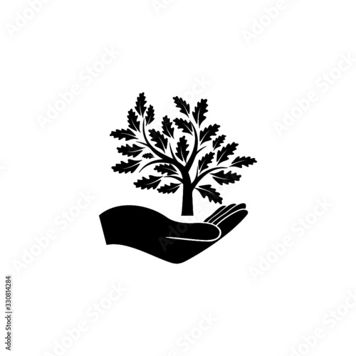 Hand with tree icon. Silhouette tree symbol. Saving forests sign