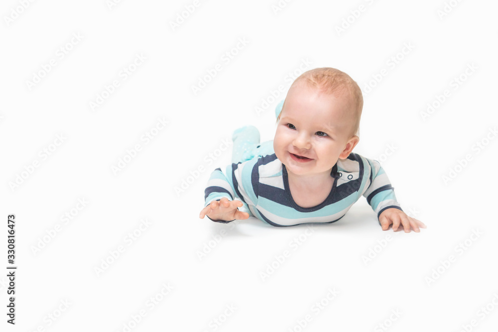 Laughing baby boy is lying on white background. Laughing baby boy is lying on white background.