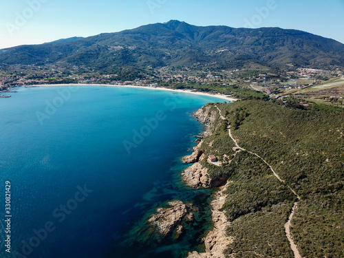 Drone view of Marina di Campo gulf, Elba island, Italy