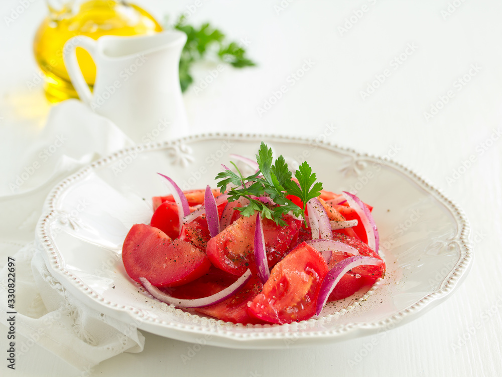 Tomato and onion salad. Selective focus