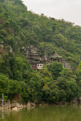 Closeup of traditional buildings on slope along Xiadong  Guilin  China.