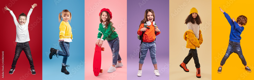Cheerful multiracial little girls and boys against vibrant background - obrazy, fototapety, plakaty 