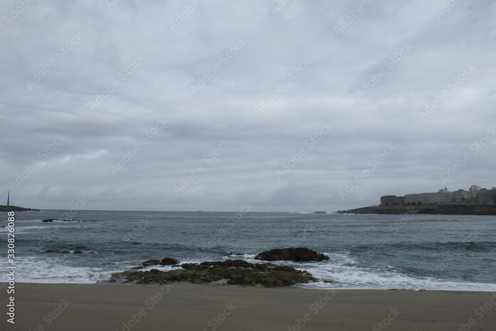 Waves on a beach in A coruna city in Spain