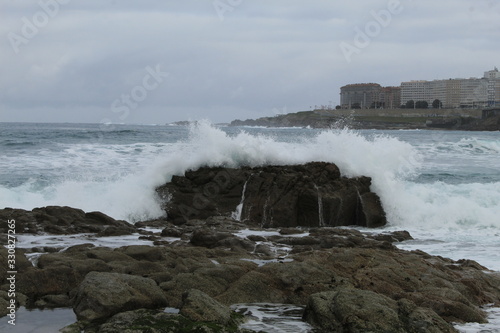 Waves on a beach in A coruna city in Spain