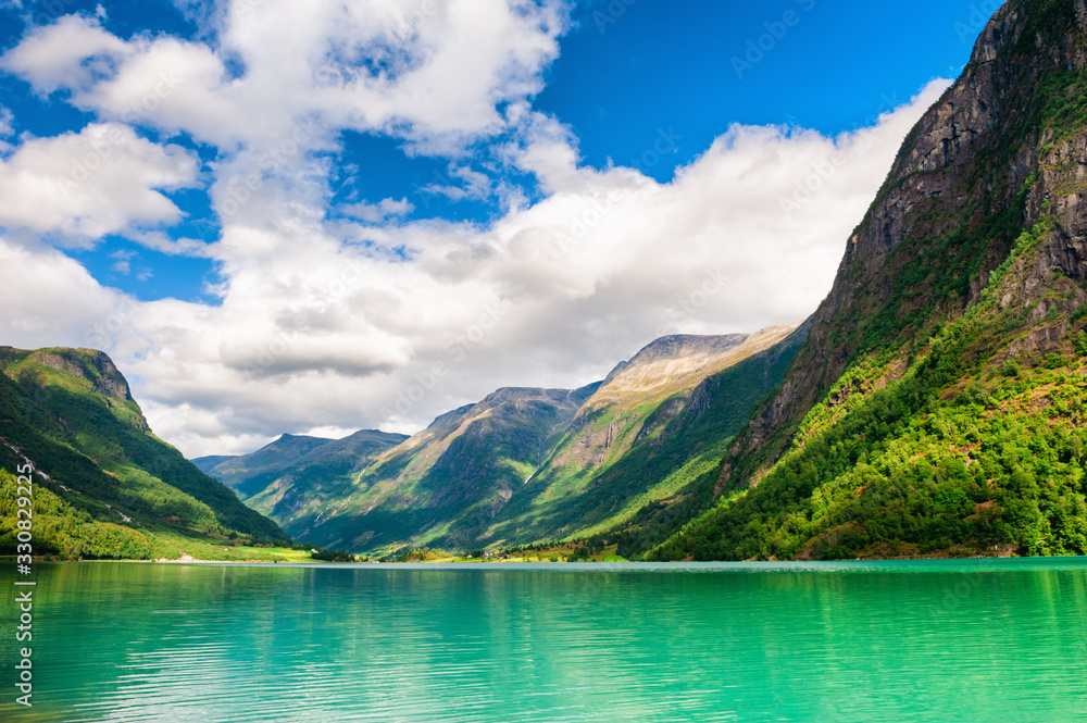 Plakat Beautiful lake with green water in the mountains in Norway. Summer landscape