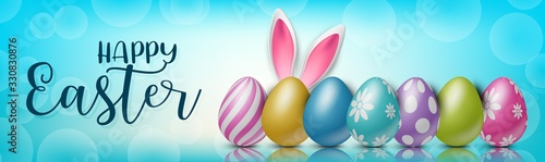 Happy Easter holiday banner or newsletter header. Colorful eggs on glass surface and blue background. Vector illustration with lettering.