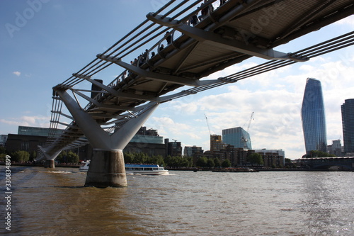 a bridge over the London River Thames seen from below