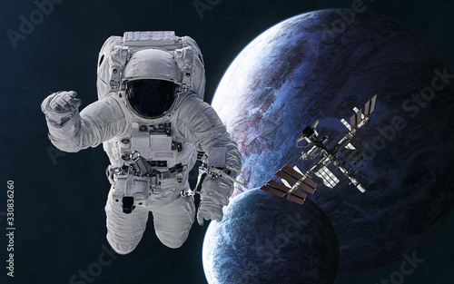 Fototapeta Naklejka Na Ścianę i Meble -  Astronaut, space station on background of planets in deep space. Science fiction. Elements of this image furnished by NASA