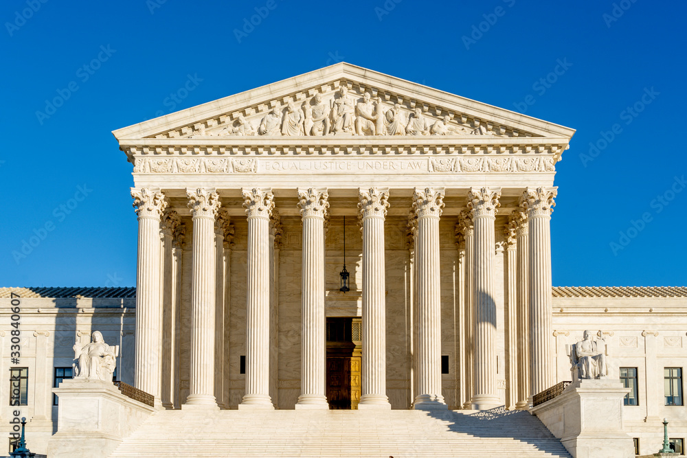 Washington D.C., USA - January 12, 2020: United States Supreme Court Building in Washington D.C., USA. The Supreme Court Building houses the Supreme Court of the United States. Washington D.C., USA - January 12, 2020: United States Supreme Court Building in Washington D.C., USA. The Supreme Court Building houses the Supreme Court of the United States.