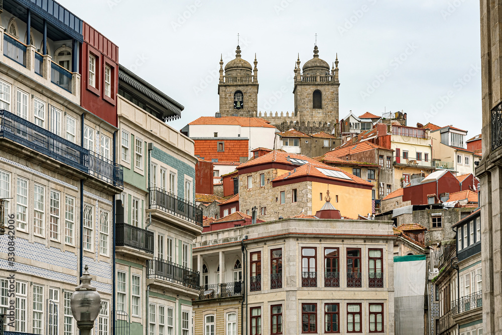 Colorful buildings in the city of Porto in Portugal. Low angle photographic view of the Cathedral in Porto
