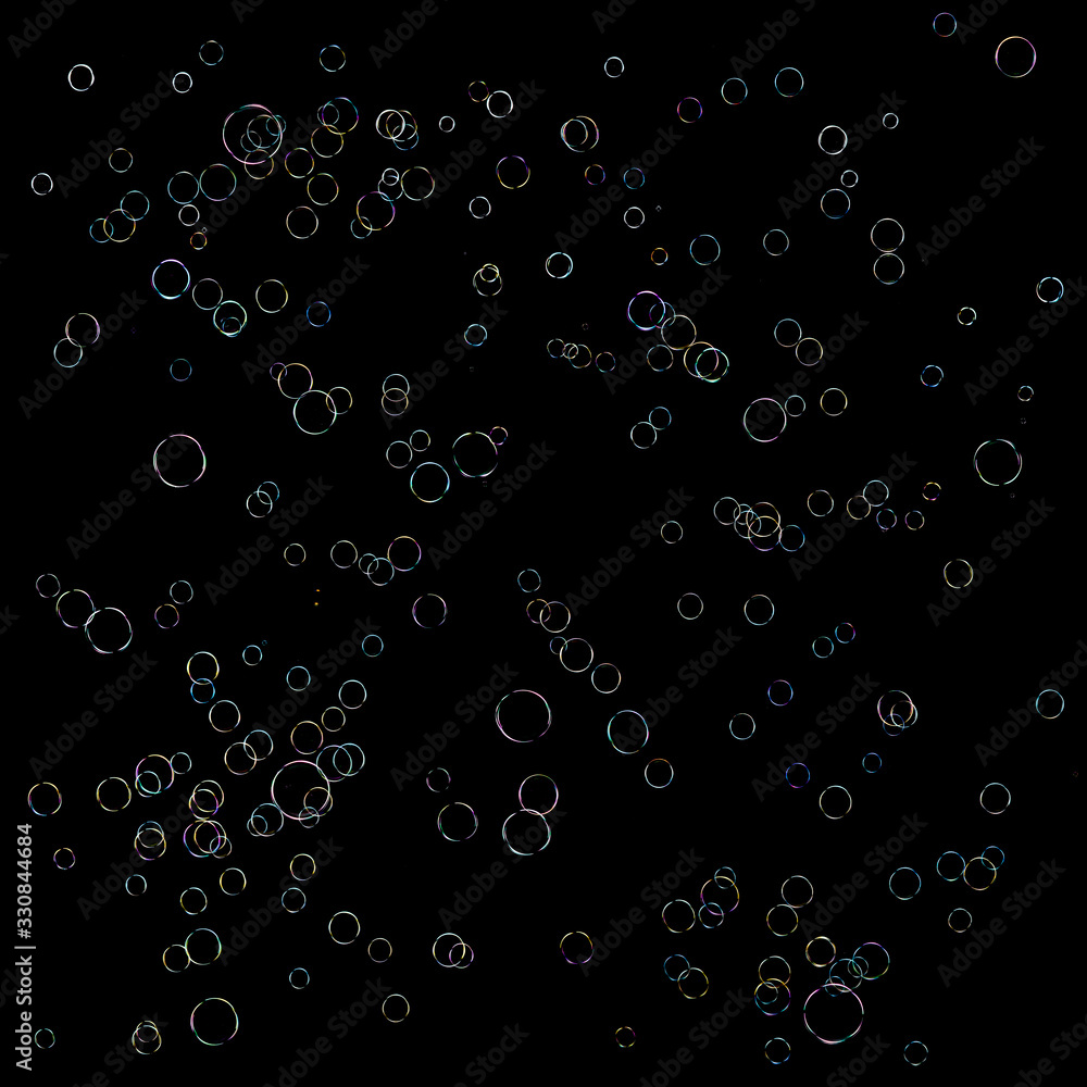Texture of soap bubbles on a black background