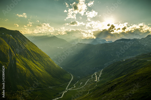 Evening mood on Furka high mountain pass with beautiful views on Alps